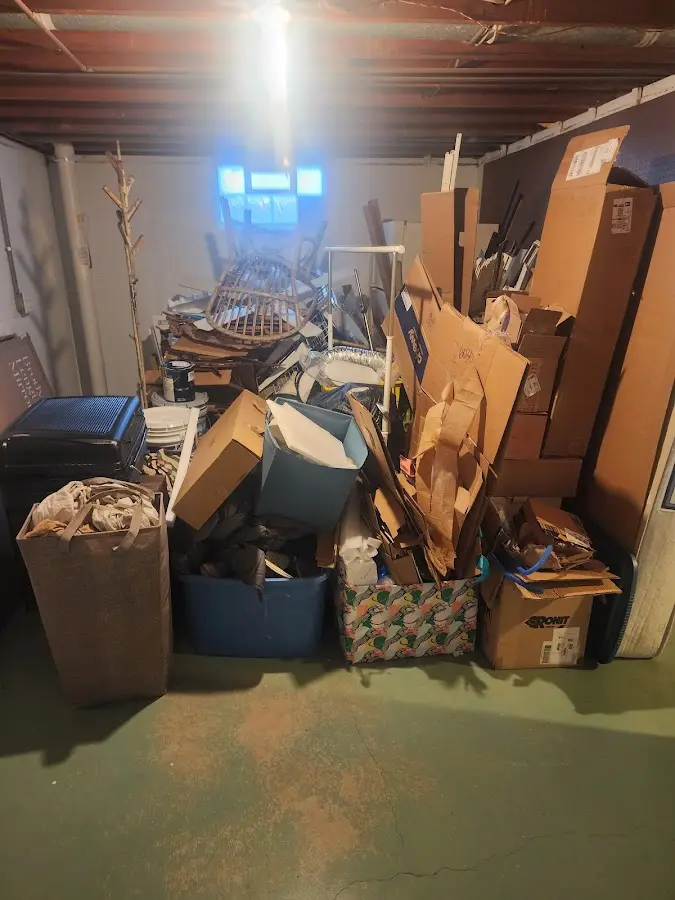 Roll-off dumpster container at job site for 8 Yard Dumpster Rental in Champlin